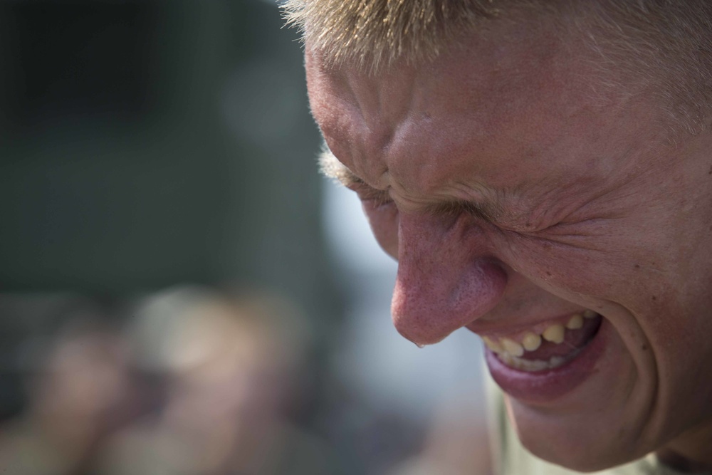 Marines in the Non-Lethal Course take part in the OC Spray Confidence Course