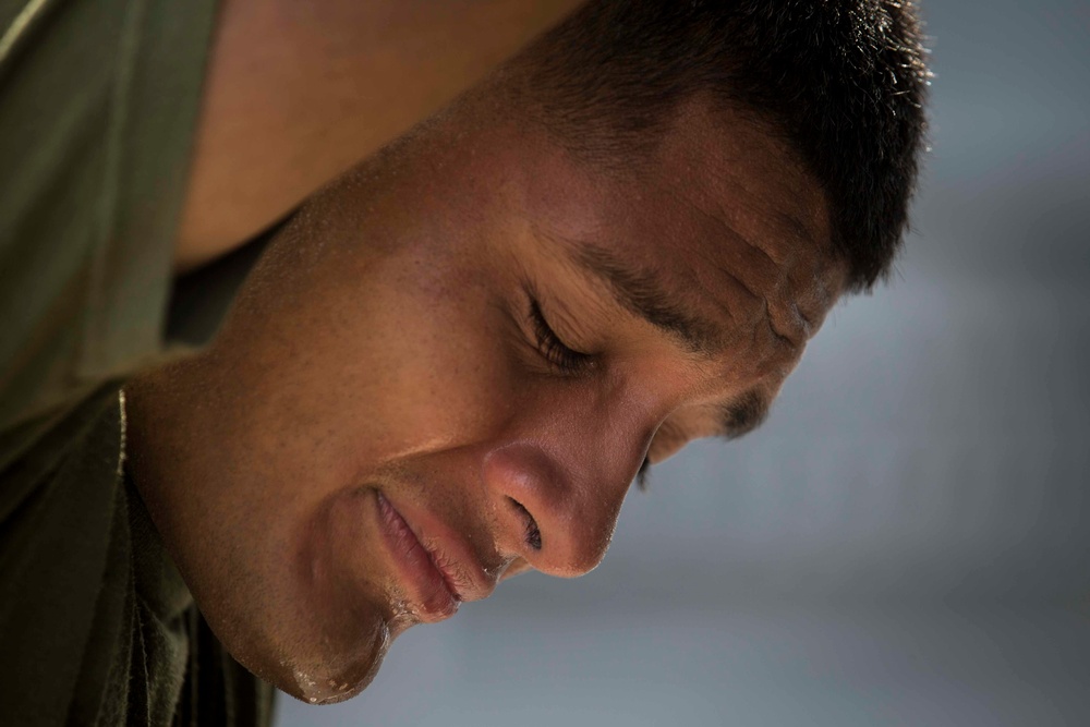 Marines in the Non-Lethal Course take part in the OC Spray Confidence Course