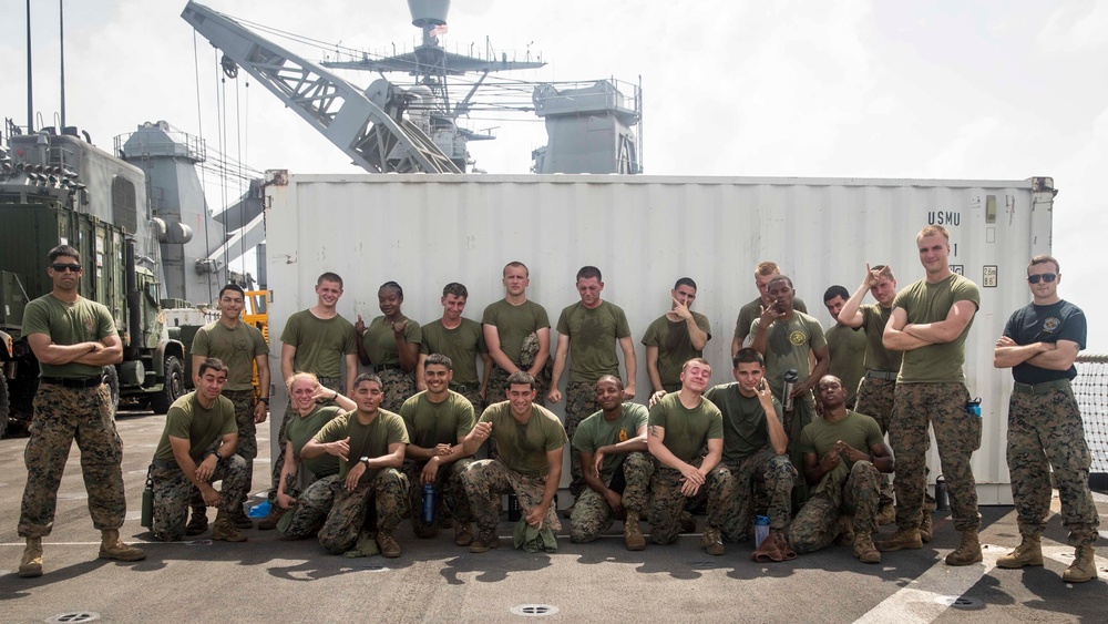 Marines in the Non-Lethal Course take part in the OC Spray Confidence Course