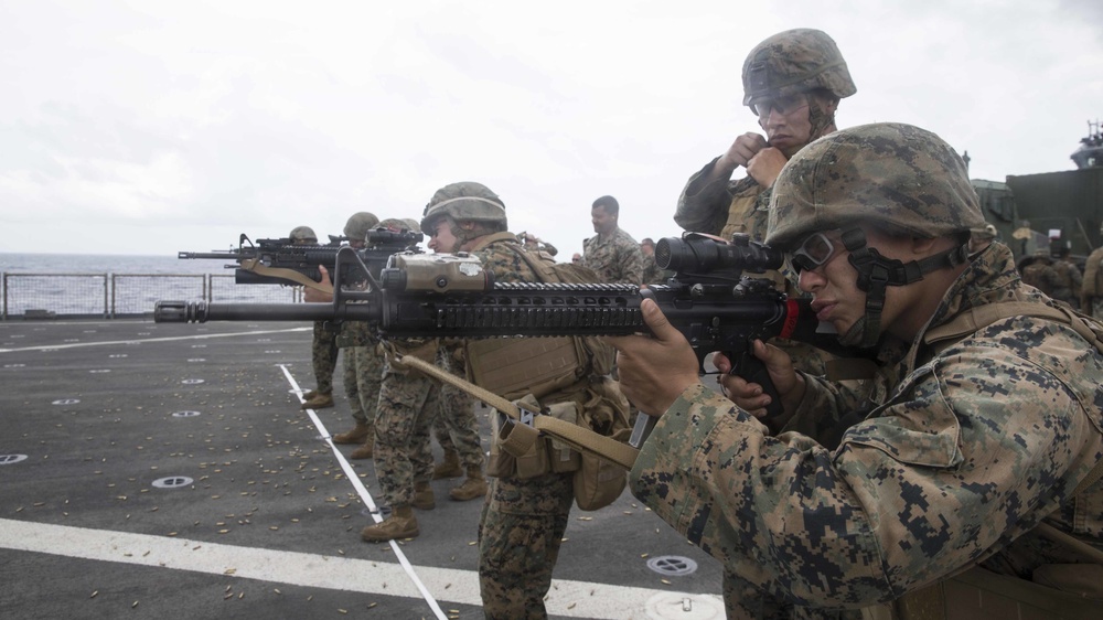 CLB 13 complete a Combat Marksmanship Shoot on the flight deck