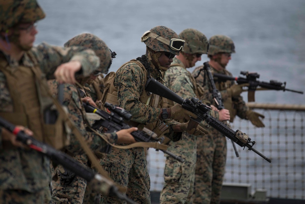 CLB 13 complete a Combat Marksmanship Shoot on the flight deck