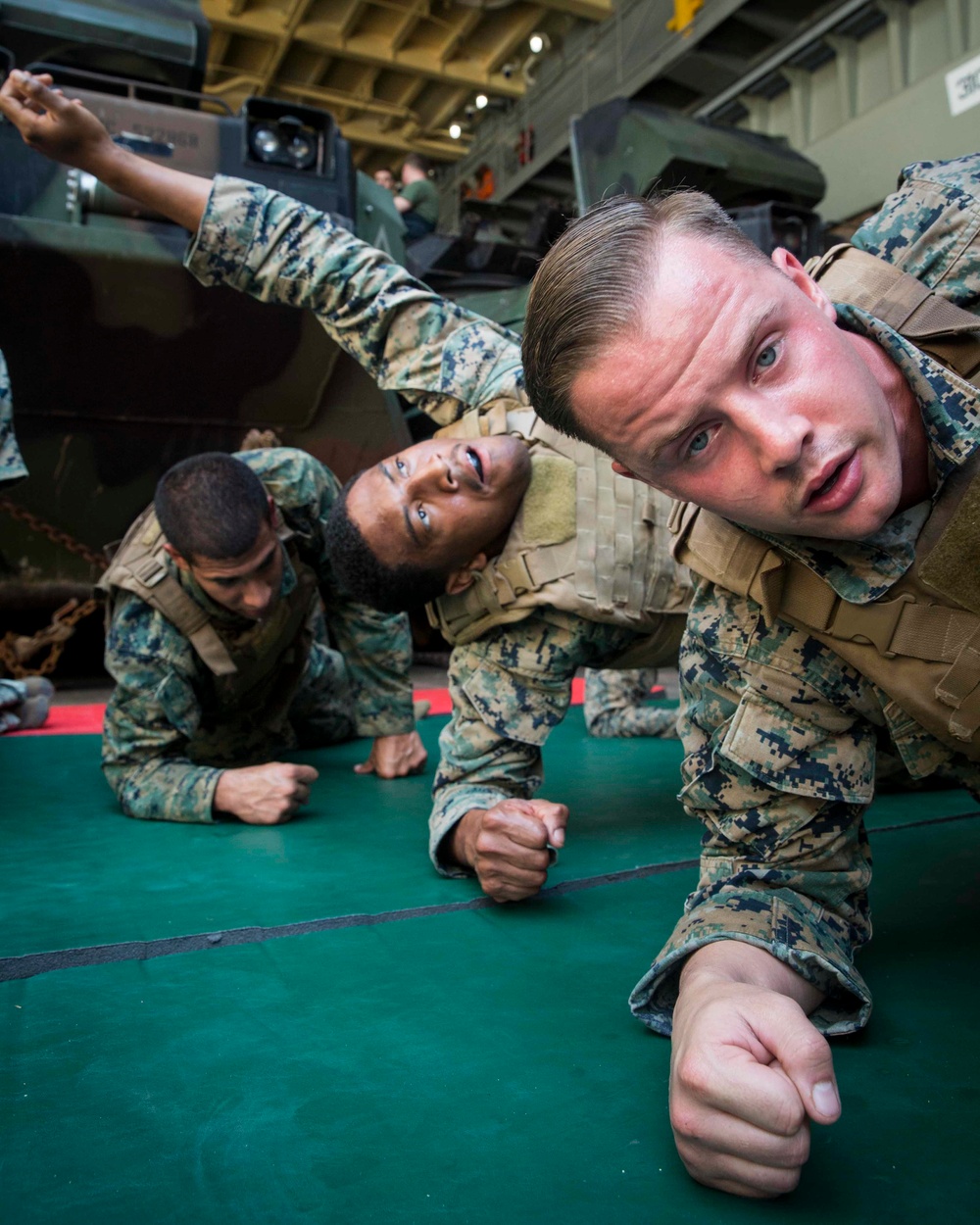 Marines in MAI Course participate in a round robin grapple match