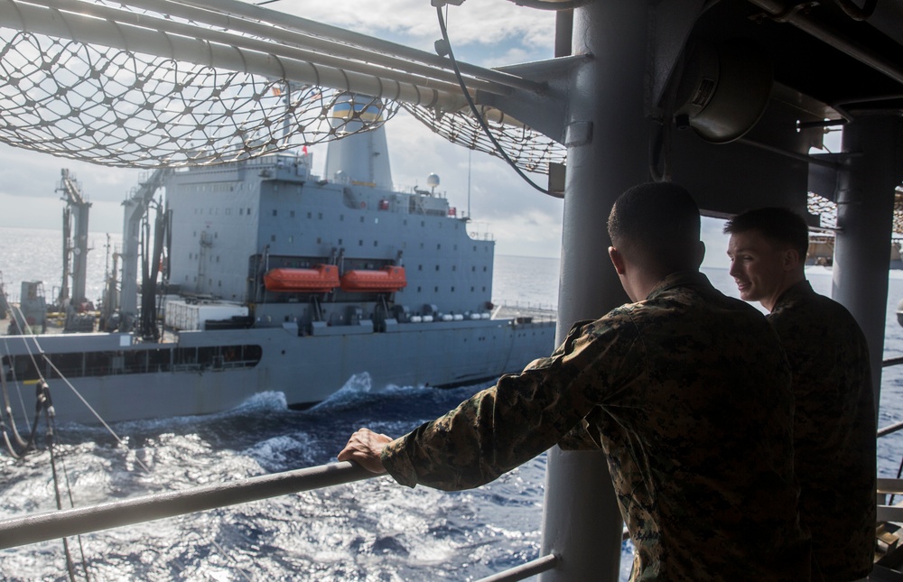 USS Iwo Jima recieves a resupply at sea