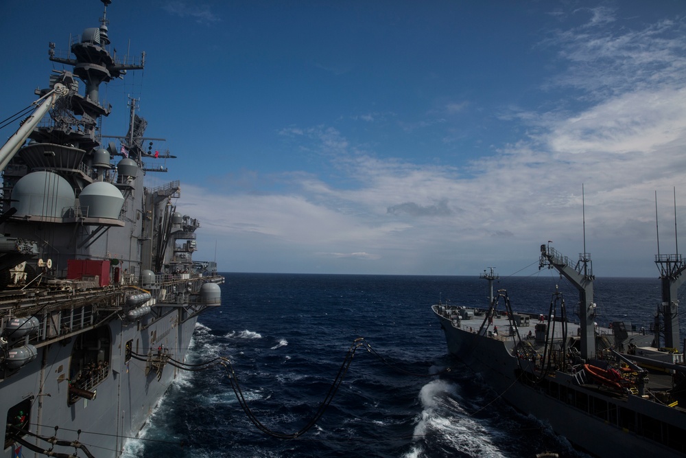 USS Iwo Jima recieves a resupply at sea