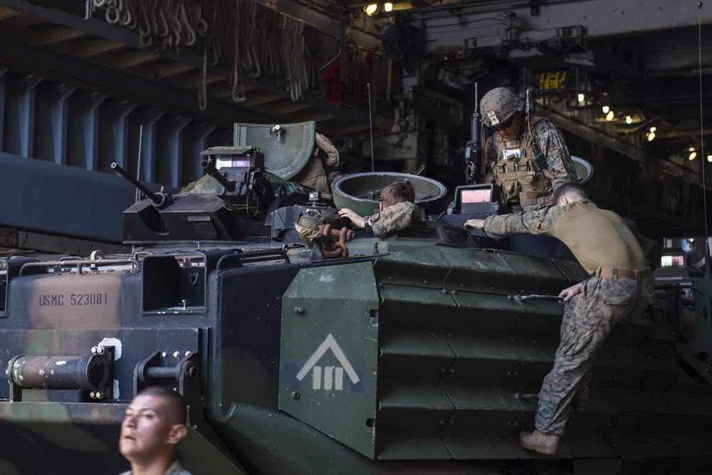 Marines attached to the 31st MEU prepare to conduct AAV operations with USS Ashland during KAMANDAG 2