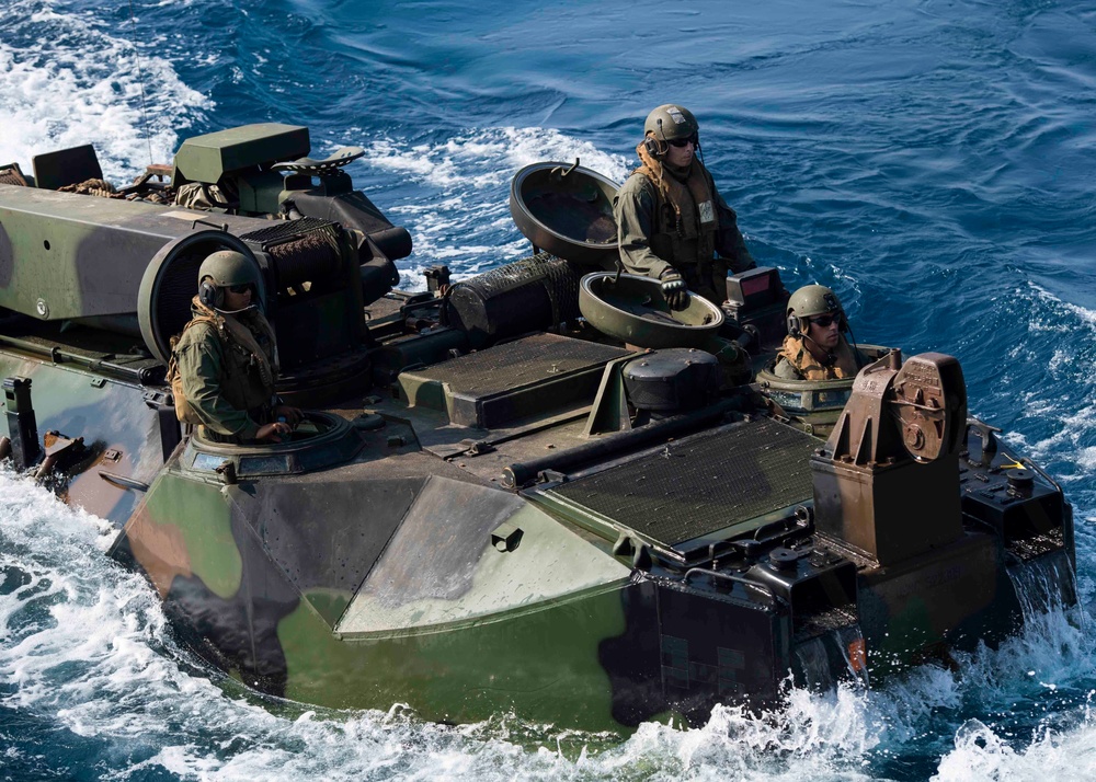 Marines attached to the 31st MEU return to the USS Ashland after completing an exercise for KAMANDAG 2