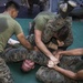 Marines with Cpl’s Course grapple for PT