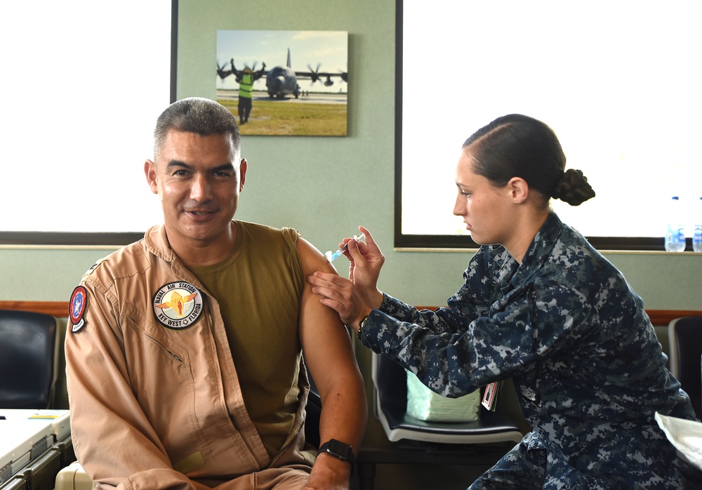 Corpsman administer an influenza vaccine