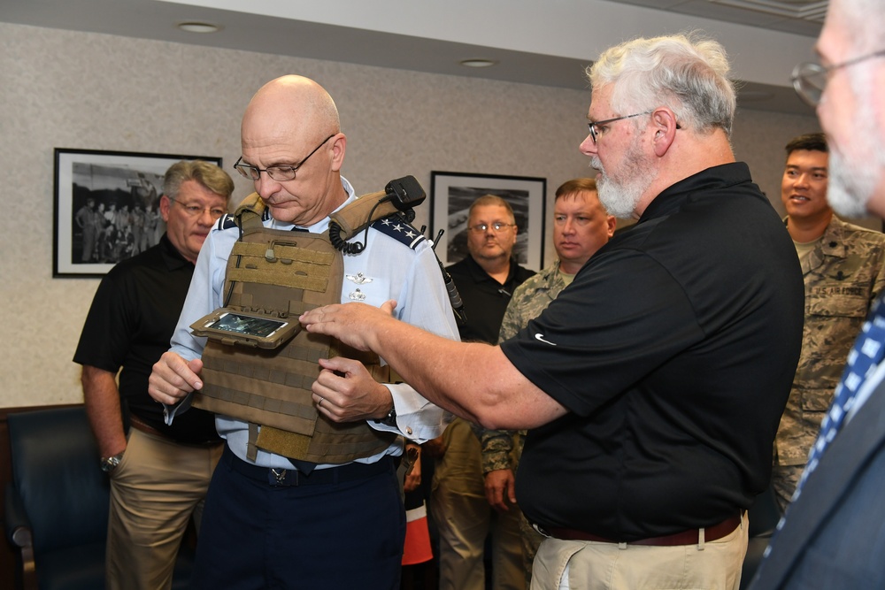 Lt. Gen. Arnold W. Bunch dons the Airborne Extensible Relay Over-the-Horizon Network concept combat tactical vest