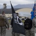 JBER commemorates POW/MIA through ceremony, ruck march and ASYMCA of Alaska food drive