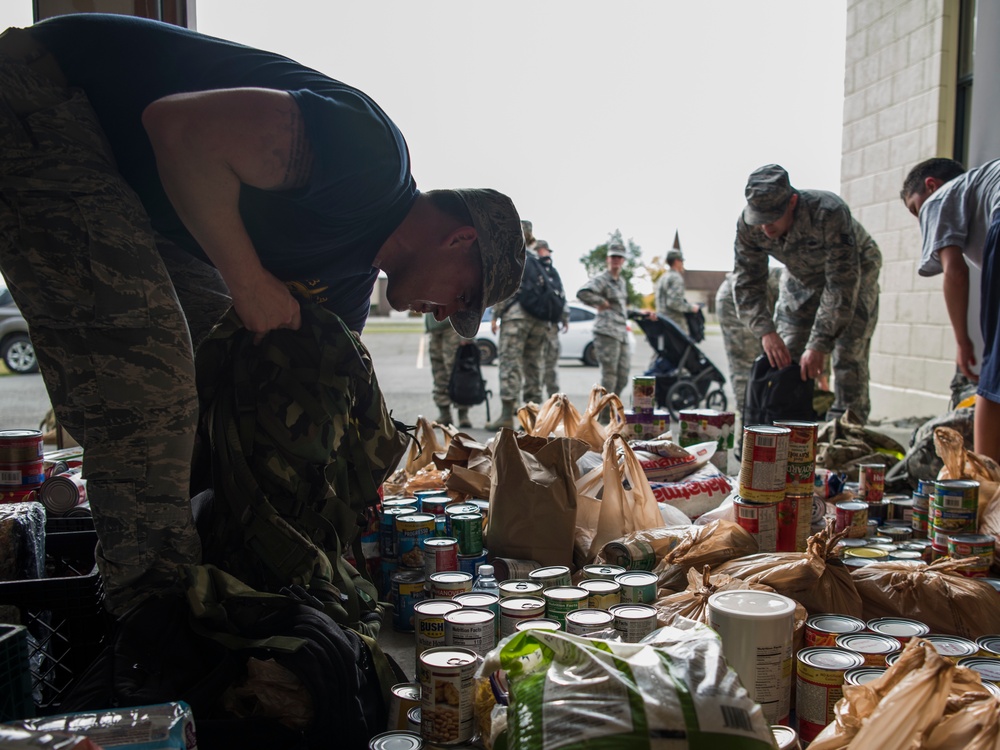 JBER commemorates POW/MIA through ceremony, ruck march and ASYMCA of Alaska food drive