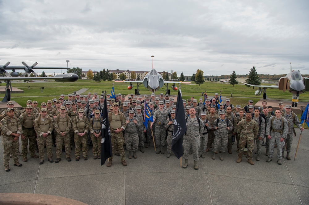 JBER commemorates POW/MIA through ceremony, ruck march and ASYMCA of Alaska food drive