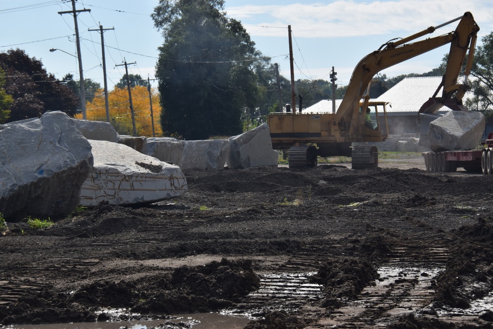 Transporting armor stone for the Oswego Harbor west breakwater repair project