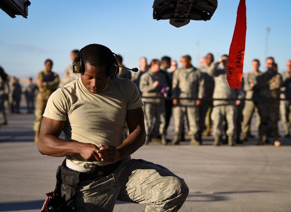 Weapons loaders compete in 3rd quarter load crew competition