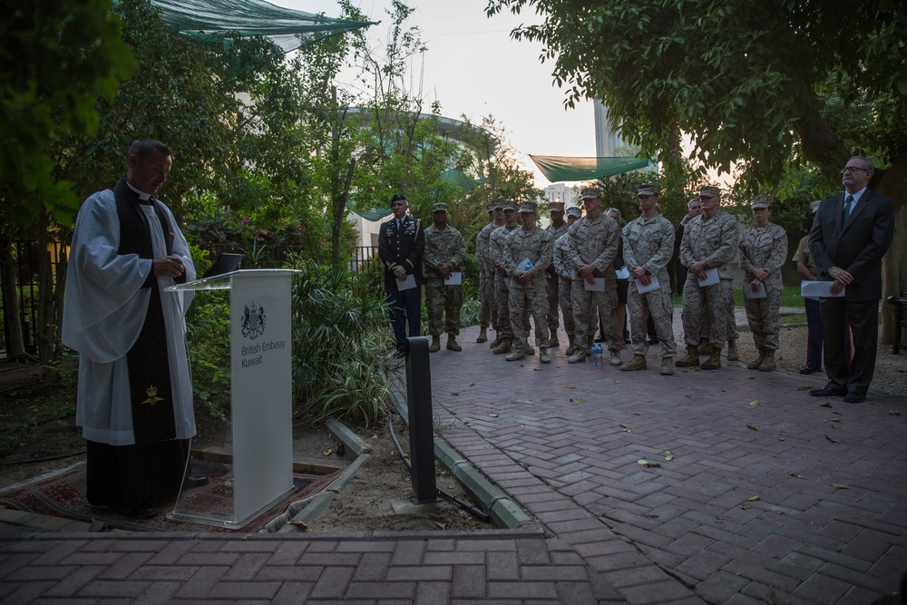 U.S. Marines with SPMAGTF-CR-CC attends a memorial service