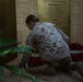 U.S. Marines with SPMAGTF-CR-CC attend a memorial service