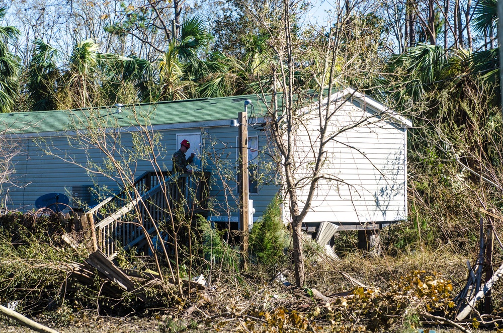Florida National Guard 's CERF-P rescue teams search devastated neighborhoods in Gulf County