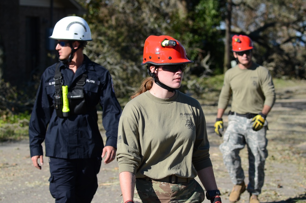 Florida National Guard 's CERF-P rescue teams search devastated neighborhoods in Gulf County