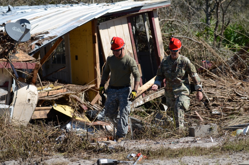 Florida National Guard 's CERF-P rescue teams search devastated neighborhoods in Gulf County