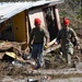 Florida National Guard 's CERF-P rescue teams search devastated neighborhoods in Gulf County