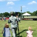 Missouri Air National Guard mom with her two children marching behind