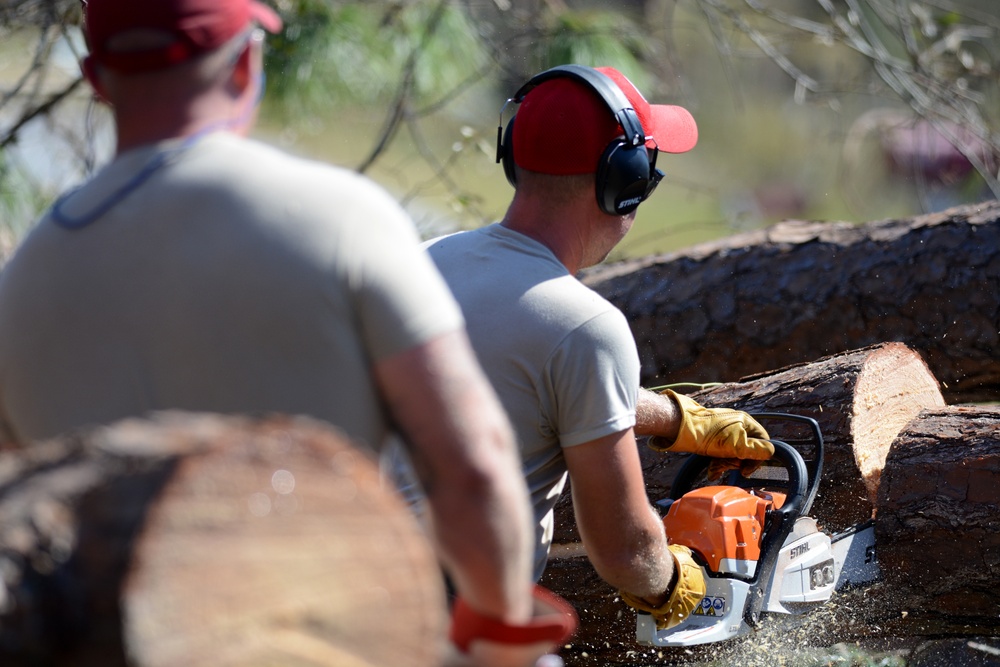 Air Guardsmen Free Streets of Fallen Trees