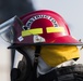 U.S. and NATO firefighters forge through the flames