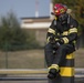 U.S. and NATO firefighters forge through the flames