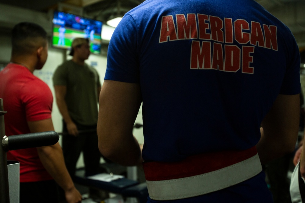Make sure to stretch – Marines and Sailors compete in powerlifting competition aboard Wasp