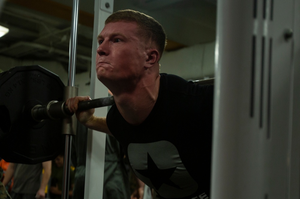 Make sure to stretch – Marines and Sailors compete in powerlifting competition aboard Wasp