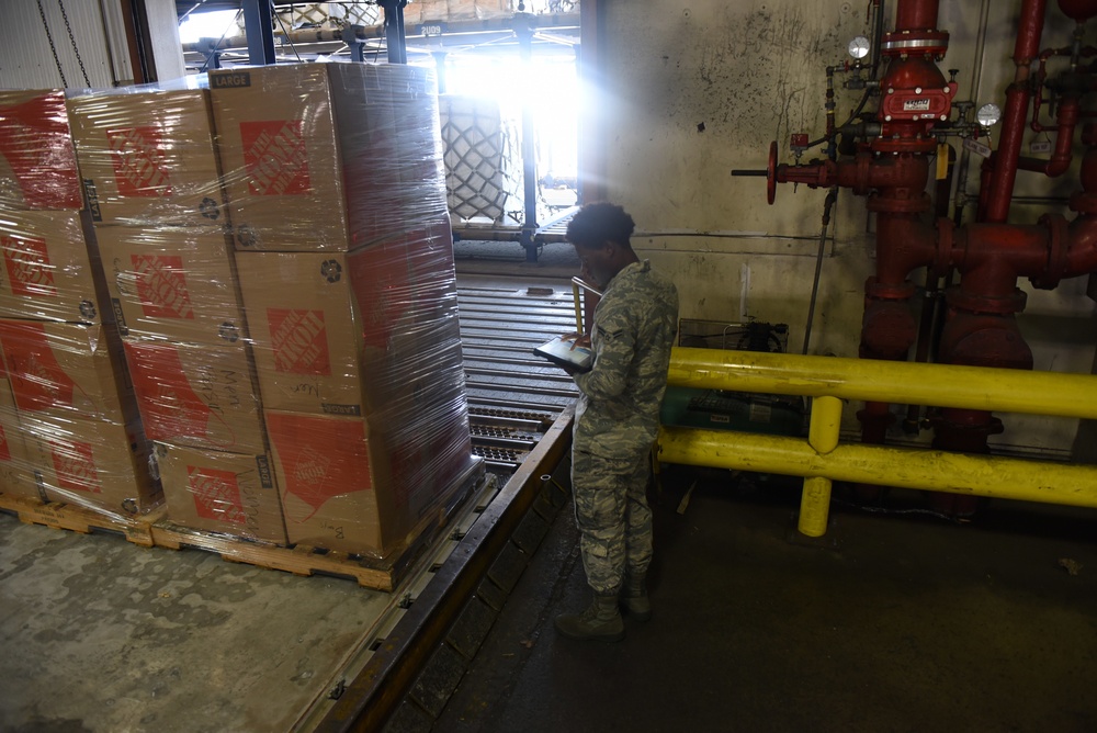 Travis' APS aids Afghan. Refugees