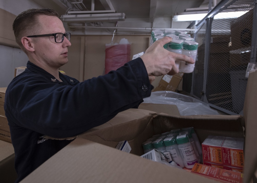 USNS Comfort Organizes Medical Supplies for Mission Stops