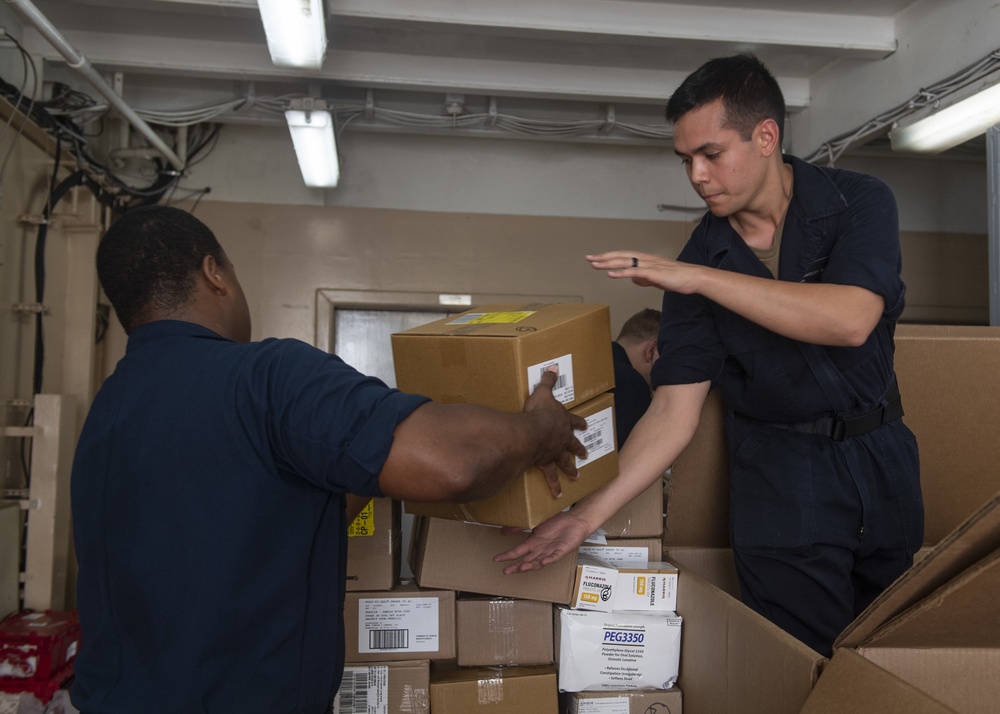 USNS Comfort Organizes Medical Supplies for Mission Stops