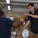 USNS Comfort Organizes Medical Supplies for Mission Stops