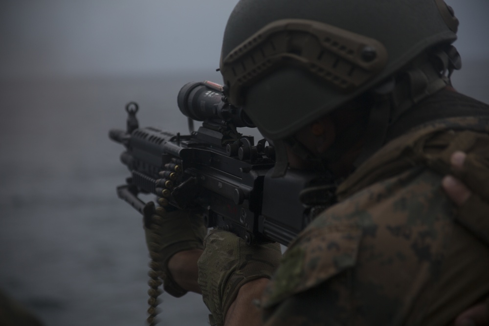 31st MEU recon Marines spit fire and lead during machine gun training aboard Wasp