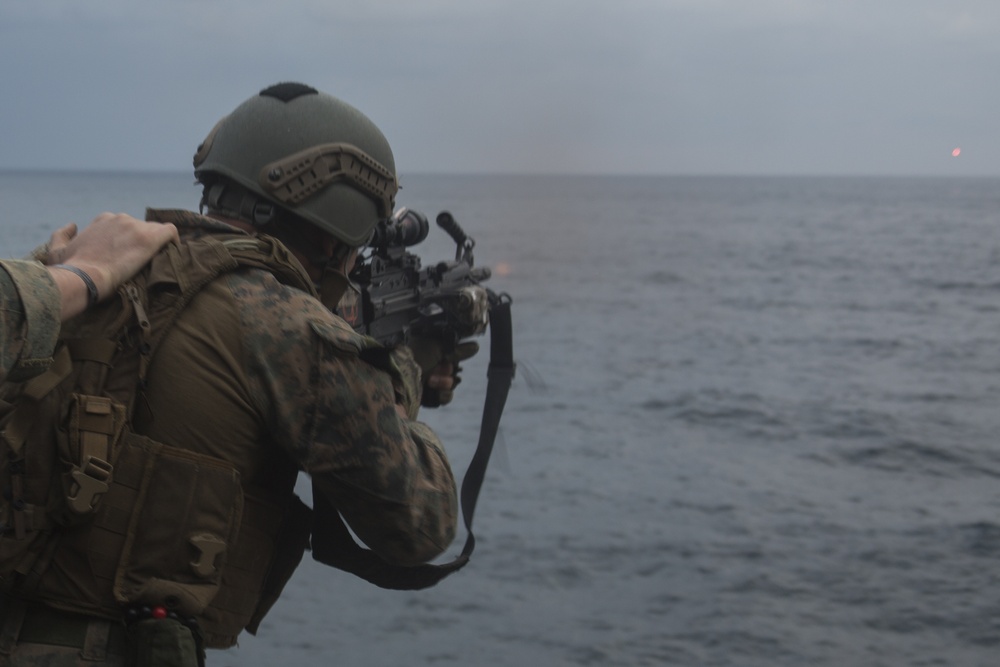 31st MEU recon Marines spit fire and lead during machine gun training aboard Wasp