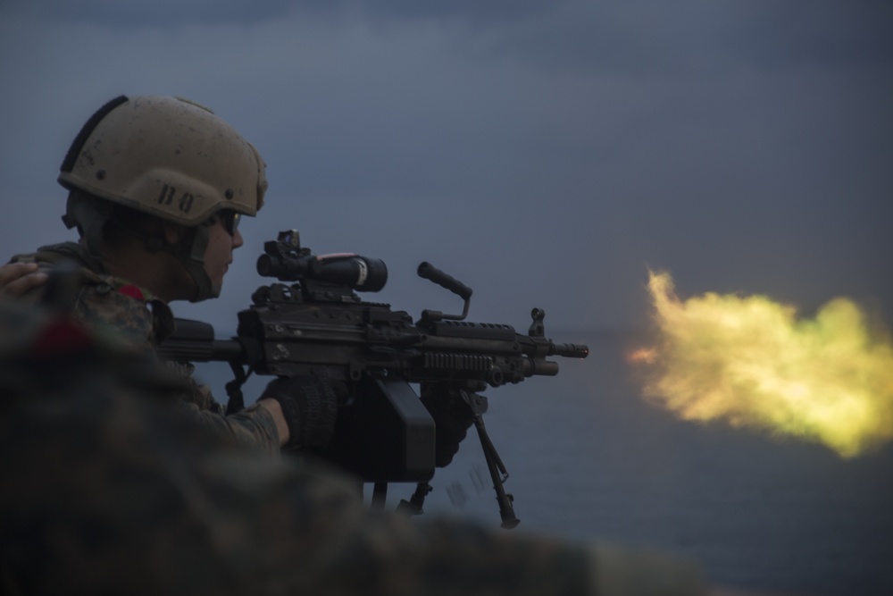 31st MEU recon Marines spit fire and lead during machine gun training aboard Wasp