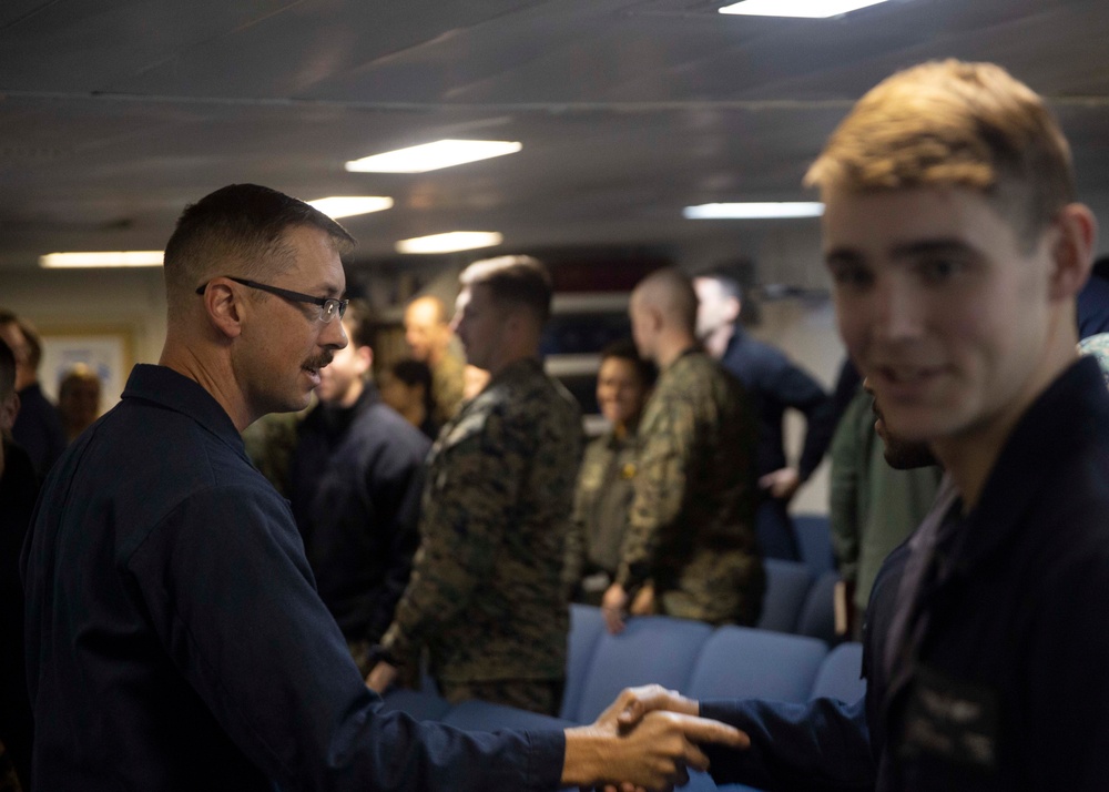 Church service aboard ship for Marines and sailors