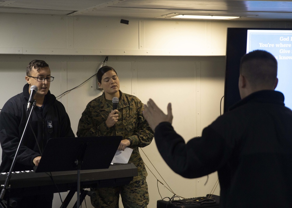 Church service aboard ship for Marines and Sailors