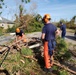 Coast Guard members help clear roads throughout North Western Florida after Hurricane Michael