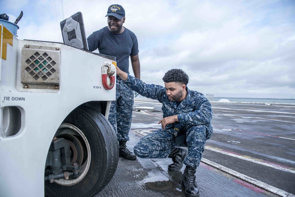 Sailors Conduct Maintenance