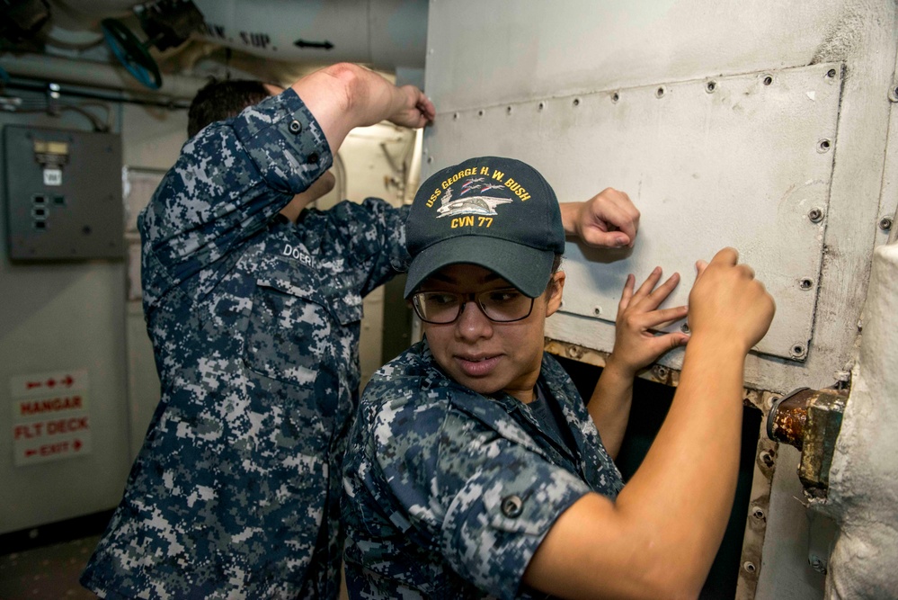 Sailors Conduct Maintenance
