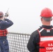 Coast Guard Cutter Legare shoots line to tow disabled fishing boat