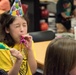 Maxwell throws a surprise birthday party for Tyndall evacuee