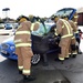 Firefighters perform auto extrication demonstration for Fire Prevention Week