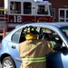 Firefighters perform auto extrication demonstration for Fire Prevention Week
