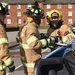Firefighters perform auto extrication demonstration for Fire Prevention Week