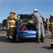 Firefighters perform auto extrication demonstration for Fire Prevention Week