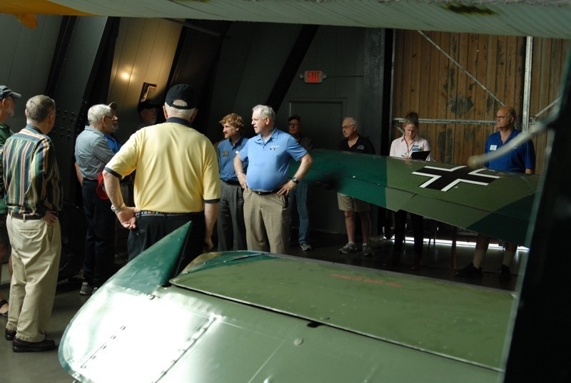 Museum volunteers tour aviation museum