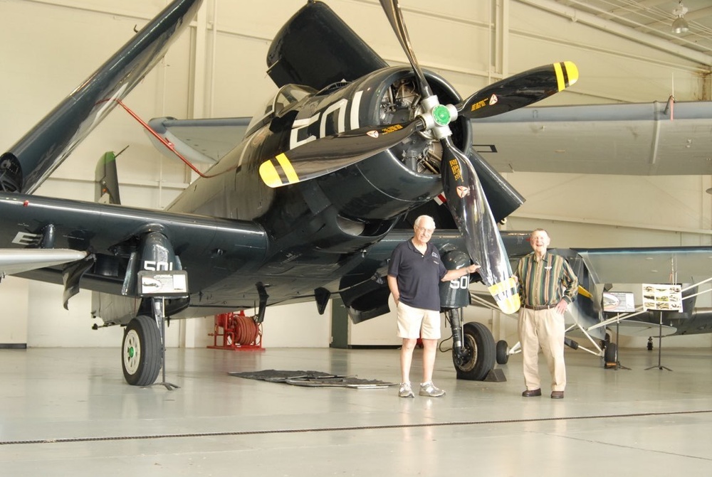 Museum volunteers tour aviation museum